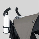 Chicco Liteway stroller in Dune color with a gray canopy and a white water bottle in a holder.