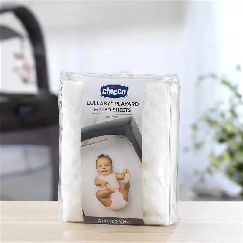 Chicco Lullaby Playard Sheet package featuring an ivory quilted sheet and a baby on the front, sized 26x39.5 inches.