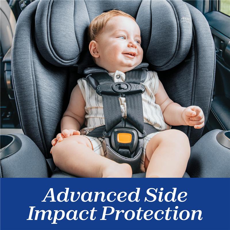 Chicco OneFit LX ClearTex All-in-One Car Seat with a smiling baby securely harnessed, showcasing advanced side impact protection.