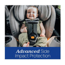 Chicco Onefit Max Cleartex All-In-One Car Seat with a smiling baby secured in it, highlighting advanced side impact protection.