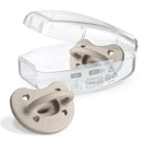 Grey Chicco Physioforma Luxe Pacifier for ages 6-16 months, displayed with a clear sterilizing case featuring usage instructions.