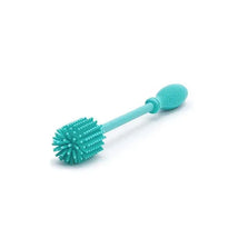 Chicco Silicone Bottle Brush in turquoise color designed for effective cleaning of baby bottles with soft bristles.