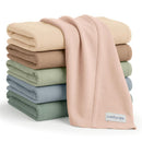 Ultra-absorbent Comfy Cubs 6-pack baby burp cloths in soft multicolor fabrics stacked neatly.