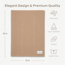 Soft beige baby burp cloth with dimensions, featuring icons for breathable, highly absorbent, durable, and sensitive skin.