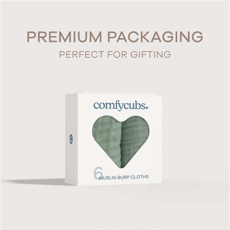 Comfy Cubs 6-pack of muslin burp cloths in premium packaging, featuring a heart-shaped window to display soft green cloths.