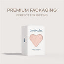 Blush Comfy Cubs muslin baby blanket packaged in a white box with a heart-shaped window, labeled for gifting.