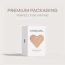 Cream-colored Comfy Cubs muslin baby blanket packaged in a white box with a heart window, labeled for gifting.