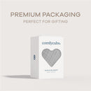 Heather blue Comfy Cubs muslin baby blanket packaged in a heart-shaped window box, labeled for gifting.