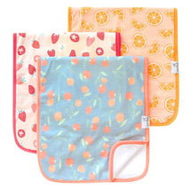 Three premium baby burp cloths from the Copper Pearl Clementine Set feature strawberry, orange slice, and peach designs.