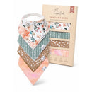 Four stylish bandana bibs in floral, striped, and polka dot patterns from Copper Pearl, designed for babies.