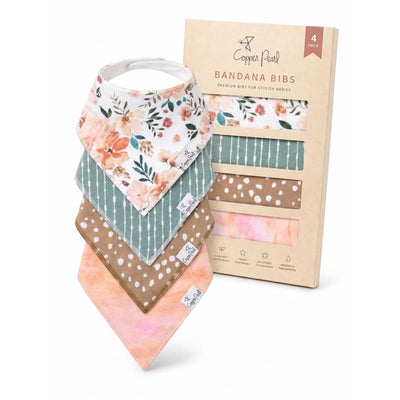 Four stylish bandana bibs in floral, striped, and polka dot patterns from Copper Pearl, designed for babies.