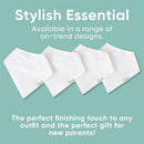 Four white bandana bibs from the Copper Pearl 4Pk White Basics Baby Bandana Bib Set, showcasing a stylish design.