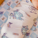 Knit blanket featuring Monsters Inc characters, including Mike, Sulley, and Boo, on a patterned background.