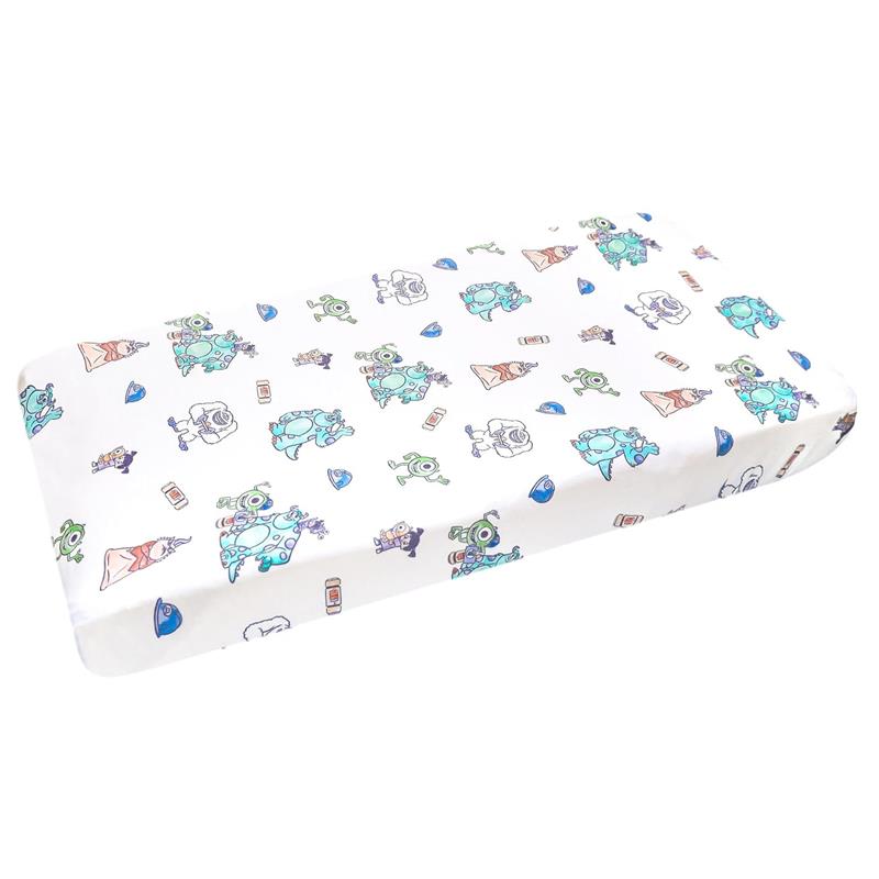 Premium diaper changing pad cover featuring colorful Monsters, Inc. characters on a white background.