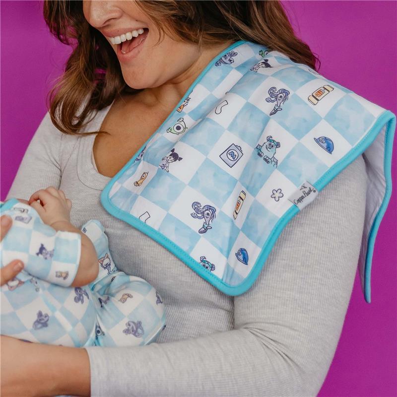 Burp cloth set featuring a blue and white checkered design with Monsters Inc. graphics, worn by a smiling woman holding a baby.