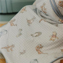 Premium 3-layer knit sleep bag featuring a Winnie the Pooh & Friends design with cartoon characters on a light blue patterned background.