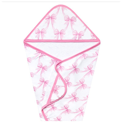 Premium baby knit hooded towel featuring a pink bow pattern with a soft interior, designed for after-bath use.