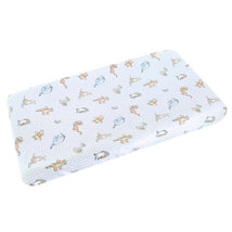 Premium diaper changing pad cover featuring Winnie The Pooh and friends on a light blue checkered background.