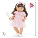 Corolle Dolls Baby Girl Doll Julie, 36 cm, wearing a pink dress and holding a white comb, suitable for ages 3 and up.