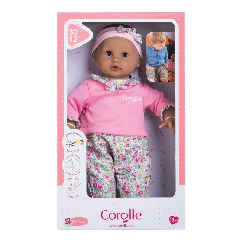 Bébé Calin Maria baby doll by Corolle, 12 inches, dressed in a pink top and floral print pants, in a pink box.