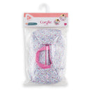 Floral-patterned Moses basket accessory for 30 cm dolls, featuring pink accents and packed in a transparent plastic bag.