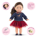 Corolle Dolls Ma Perle wearing a navy sweater, plaid collar, and red tulle skirt, featuring sleeping eyes and vanilla scent.