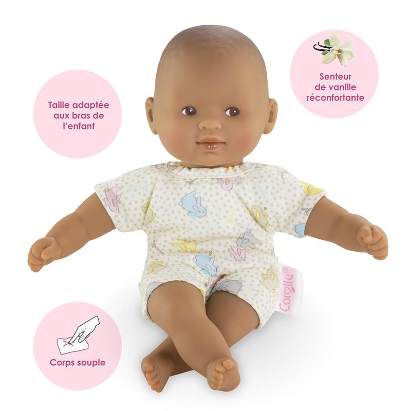 Mini Calin Bunnies Baby Doll by Corolle, with a soft body, wearing a bunny-patterned outfit, and a comforting vanilla scent.
