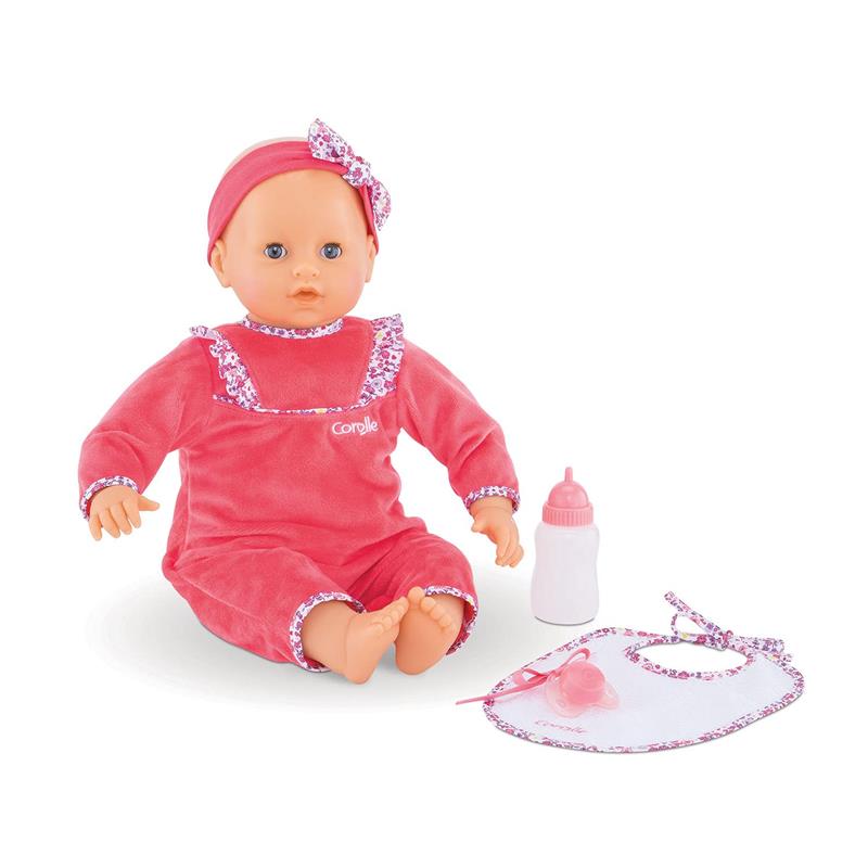 Corolle Mon Grand Poupon Purple Chérie doll dressed in pink, with bottle, bib, and a charm, featuring a vanilla fragrance.