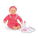 Corolle Mon Grand Poupon Purple Chérie doll dressed in pink, with bottle, bib, and a charm, featuring a vanilla fragrance.