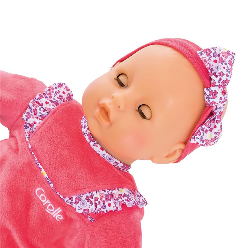 Corolle Dolls Mon Grand Poupon Purple Chérie 42 cm doll with a pink outfit, floral details, and a matching headband.
