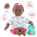 Corolle Mon Premier Poupon Bath Baby Alyzee doll with a pink headband, patterned shirt, and bath toy frog, featuring soft body and sleepy eyes.