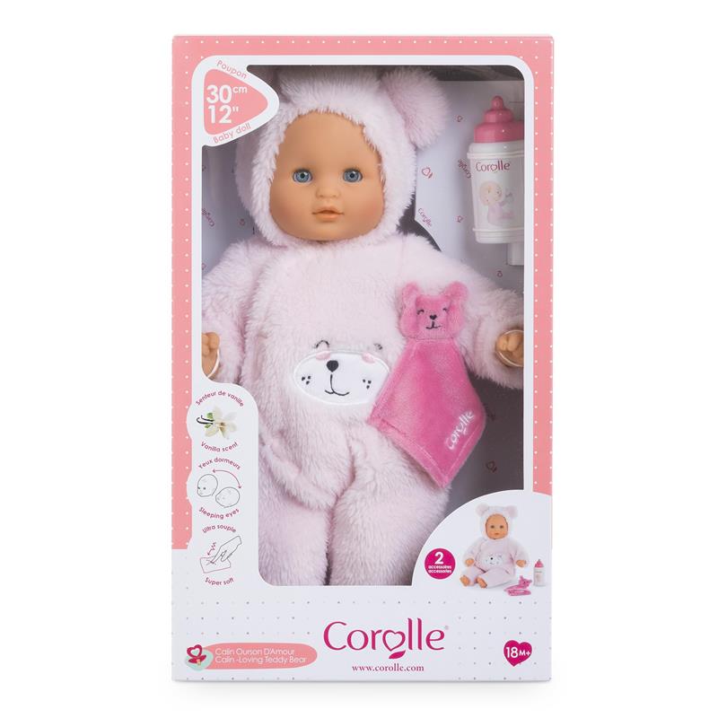 Cuddly 12-inch pink baby doll with bear outfit, vanilla scent, includes bottle and teddy bear blanket.