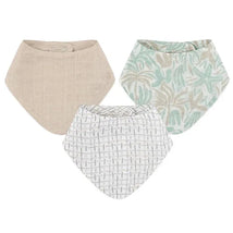 Three muslin bibs from Crane Bedding - Cove 3-Pc. set, featuring beach-themed patterns and neutral colors.