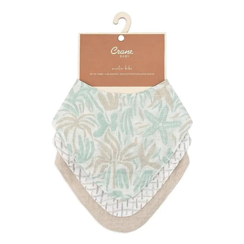 Muslin bib set featuring three designs in pastel colors with beach-themed patterns, suitable for babies 0-6 months.