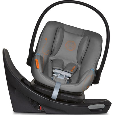 Cybex Aton G Swivel Infant Car Seat in Lava Grey, featuring a 180-degree rotation, safety harness, and padded interior.