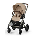 Cybex Balios S Lux travel system in Almond Beige with a reclining seat, canopy, and sleek wheels.