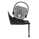 Cybex Balios S Lux Aton G2 car seat in stone grey, featuring a grey cushioned seat, adjustable handle, and base with support leg.