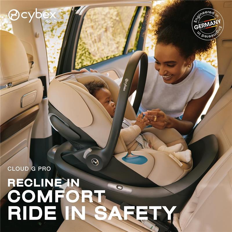 Cybex Cloud G Pro Comfort Extend Infant Car Seat in Stormy Blue is shown, with a parent interacting joyfully with a baby inside the car.
