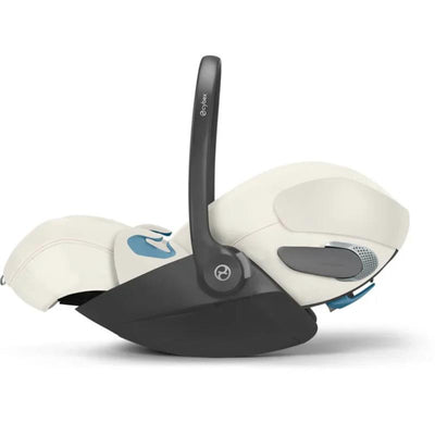 Cybex Cloud T Comfort Extend infant car seat in off white, featuring safety sensors and a sturdy handle.