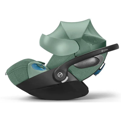 Cybex Cloud T SensorSafe Infant Car Seat in Leaf Green, featuring a secure base, adjustable canopy, and safety sensors.
