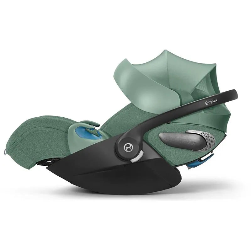 Cybex Cloud T Sensorsafe Infant Car Seat in Leaf Green, featuring a protective canopy and safety features.