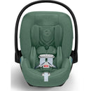 Cybex Cloud T Sensorsafe infant car seat in Leaf Green, featuring safety harness and plush cushioning for comfort.
