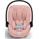 Cybex Cloud T Sensorsafe Infant Car Seat in Peach Pink with safety harness and padded interior.