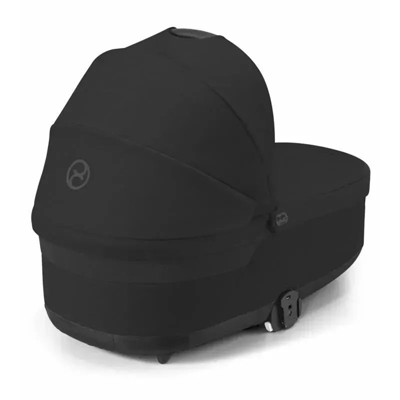 Cybex Cot S Lux 2 in Moon Black, featuring a sleek, minimal design with a protective canopy and secure base.