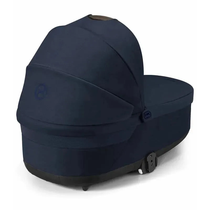 Cybex Cot S Lux 2 in Ocean Blue, showcasing a sleek design with a removable cover and adjustable features.