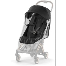 Cybex Coya Rain Cover in transparent material, designed to protect a stroller from rain while keeping visibility.