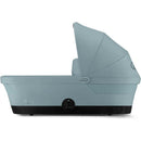 CYBEX eGazelle/Gazelle S Cot Bassinet in Stormy Blue, featuring a sleek design and adjustable canopy, suitable for infants.