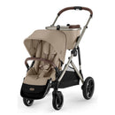 Cybex Gazelle S 2 stroller featuring a taupe frame and almond beige seat, designed for single-to-double use.