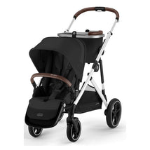 Cybex Gazelle S 2 stroller in silver frame and moon black fabric, featuring a brown handlebar and a spacious storage basket.