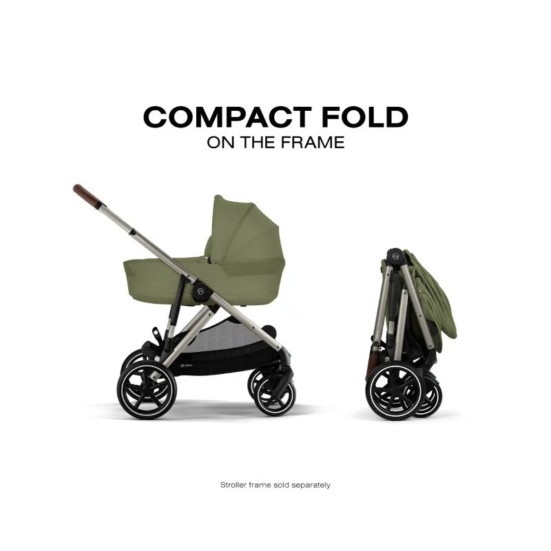 Foldable Cybex Gazelle S Cot in Moss Green, showcasing compact fold feature on the stroller frame.